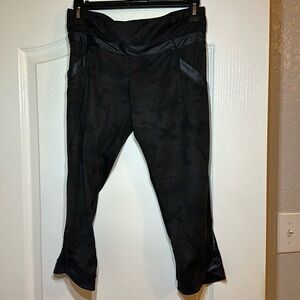 Lululemon capri leggings in women size 6.  Color is black with camo pattern